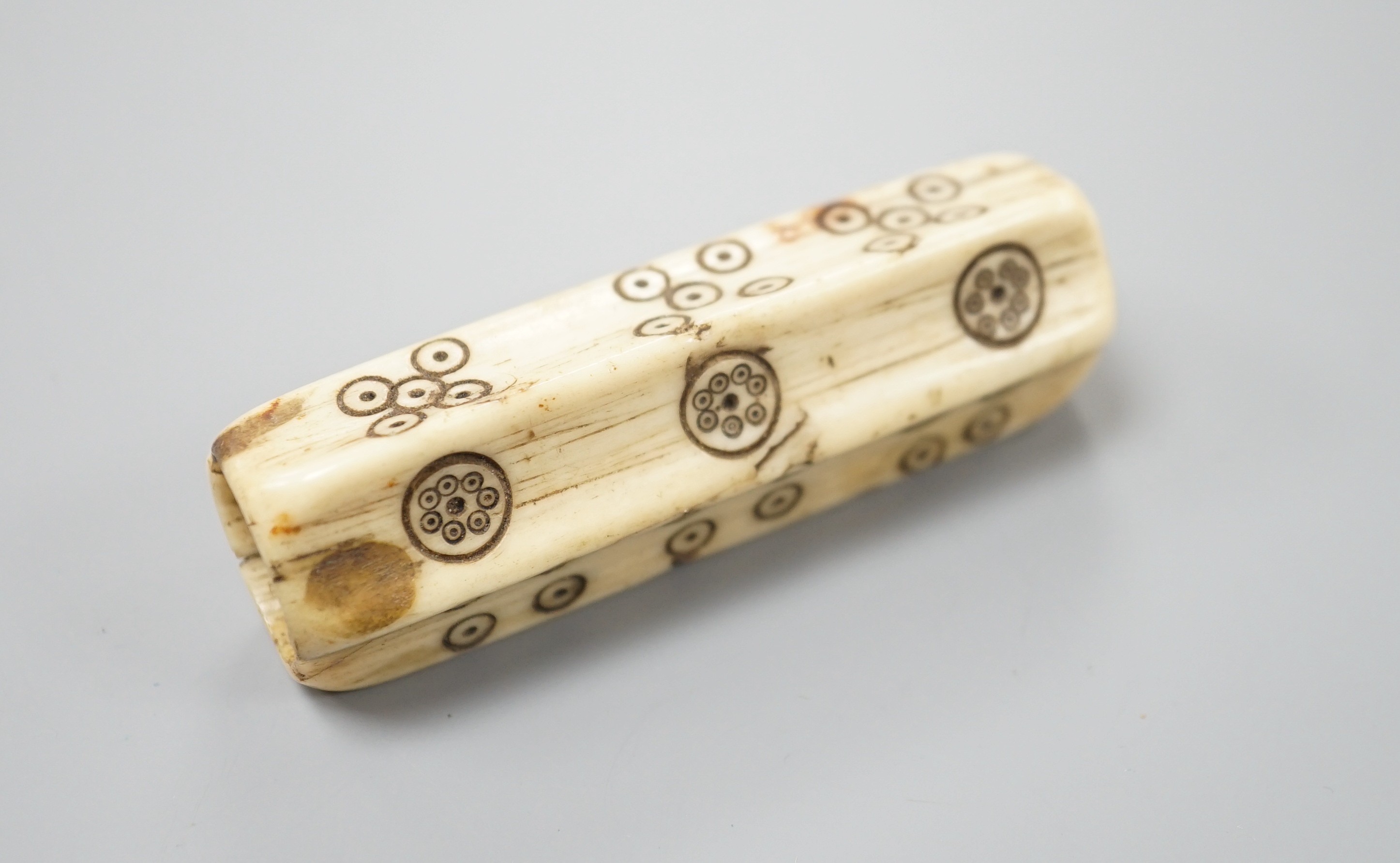 An early European bone six sided long dice, 6.8cm, cf. a similar example in the British Museum No. 1871,0910.2